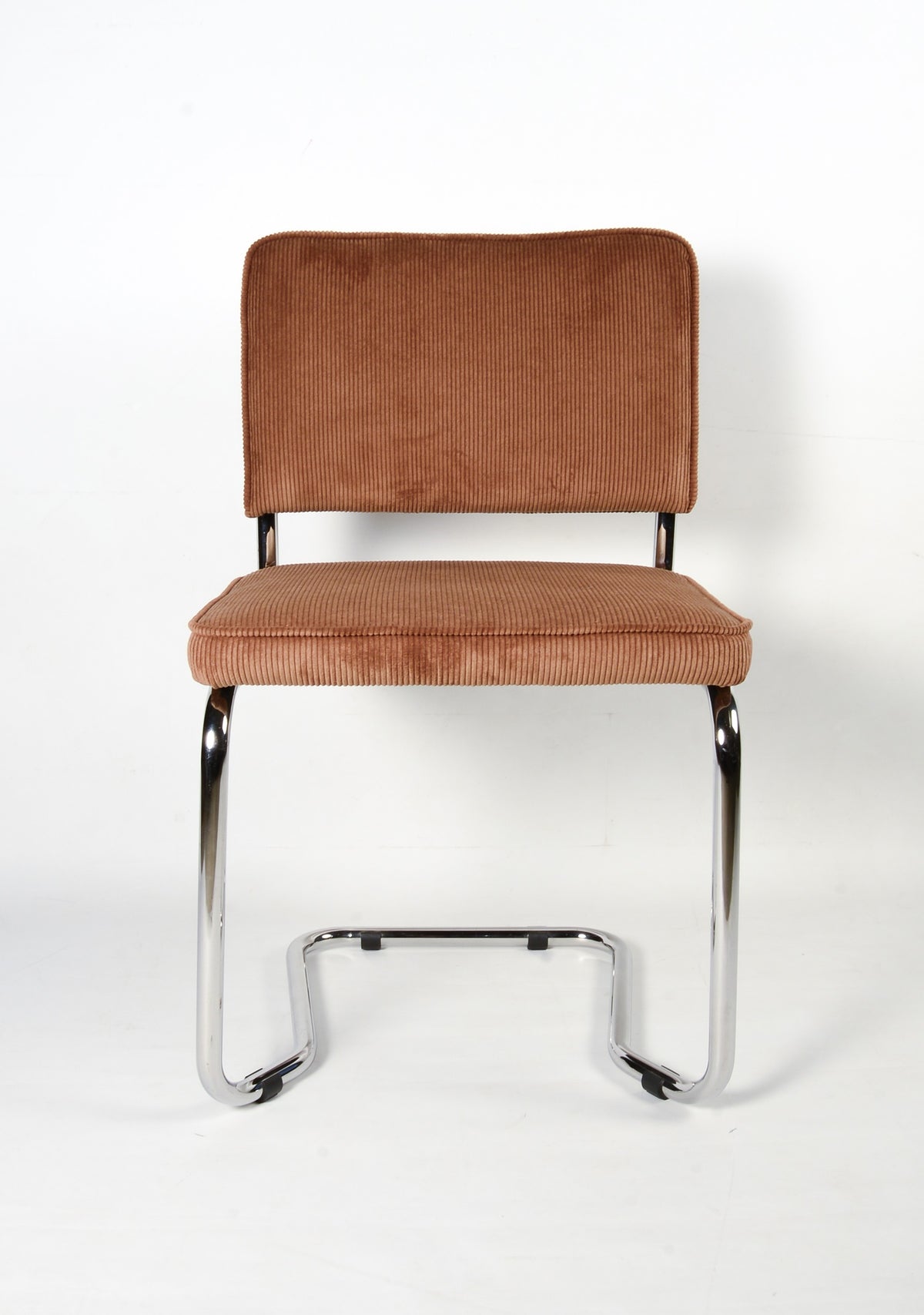 Upholstered chair with metal frame